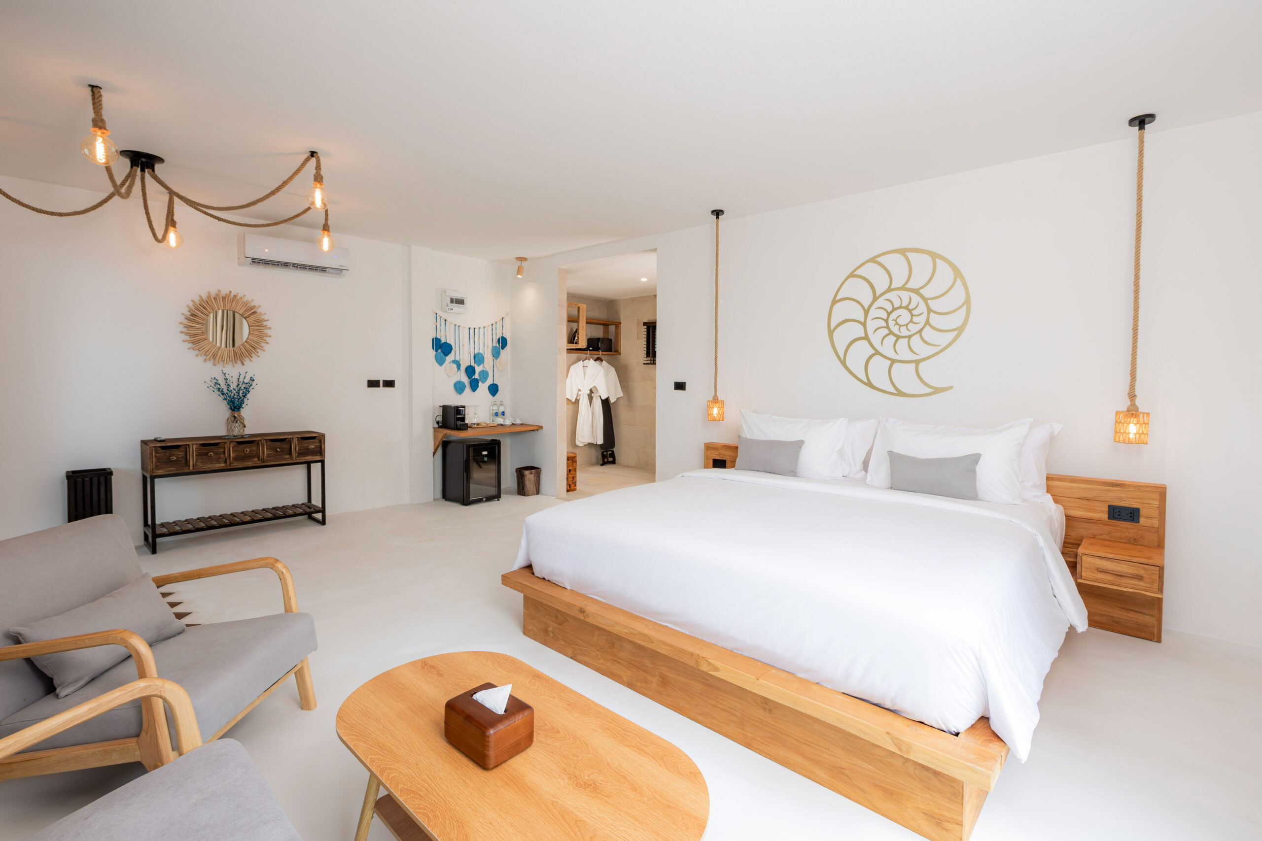 Living and sleeping area sea view pool villa